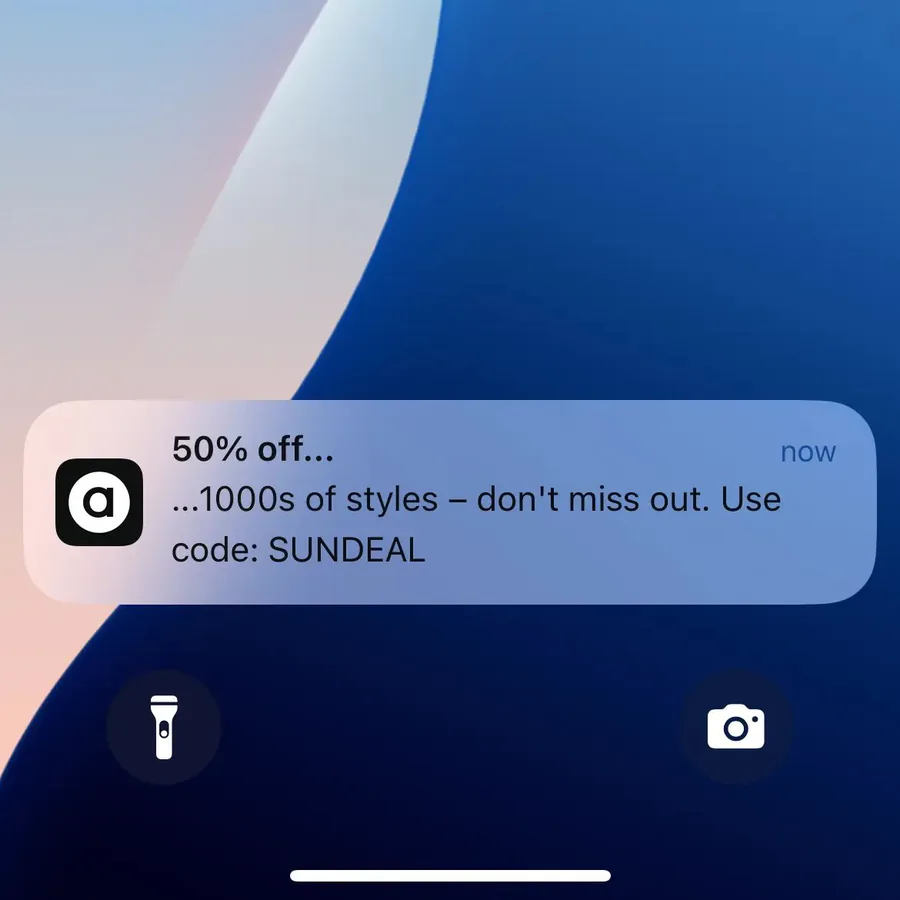 ASOS push notification: 50% off.... ...1000s of styles - don't miss out. Use code: SUNDEAL